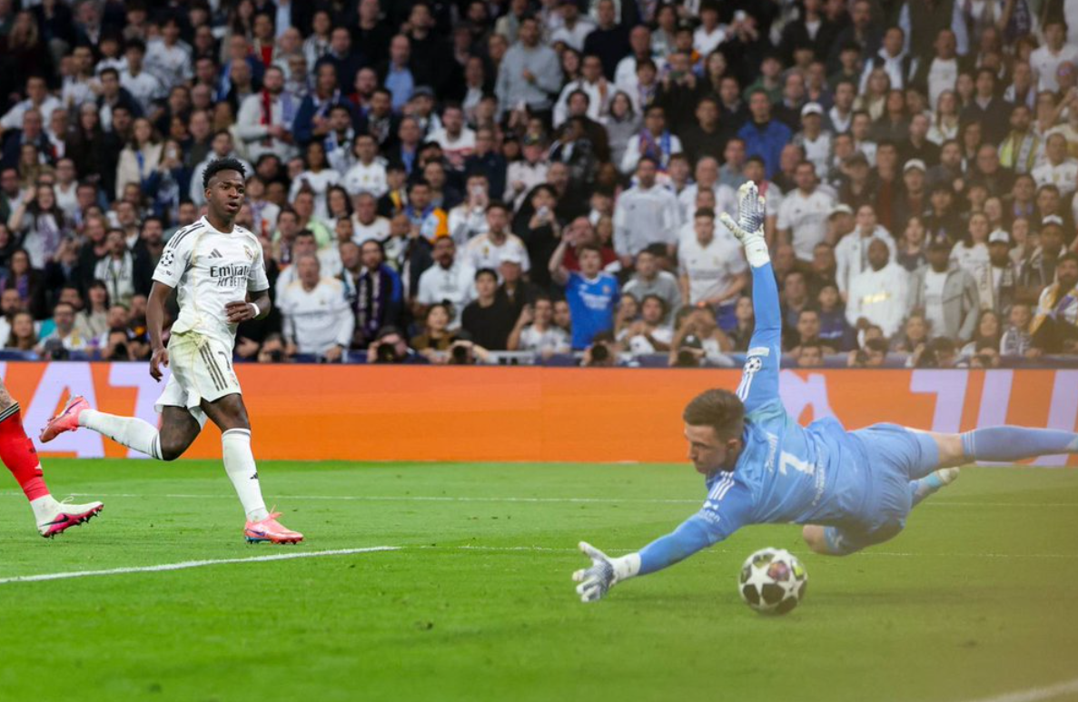 Real Madrid survive Benfica scare to reach last 16