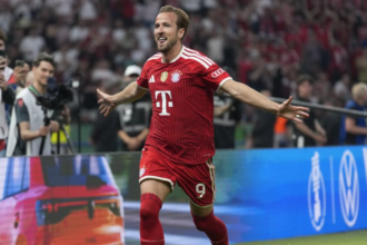 Harry Kane celebrates after scoring for Bayern Munich in Bundesliga match