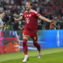 Harry Kane celebrates after scoring for Bayern Munich in Bundesliga match