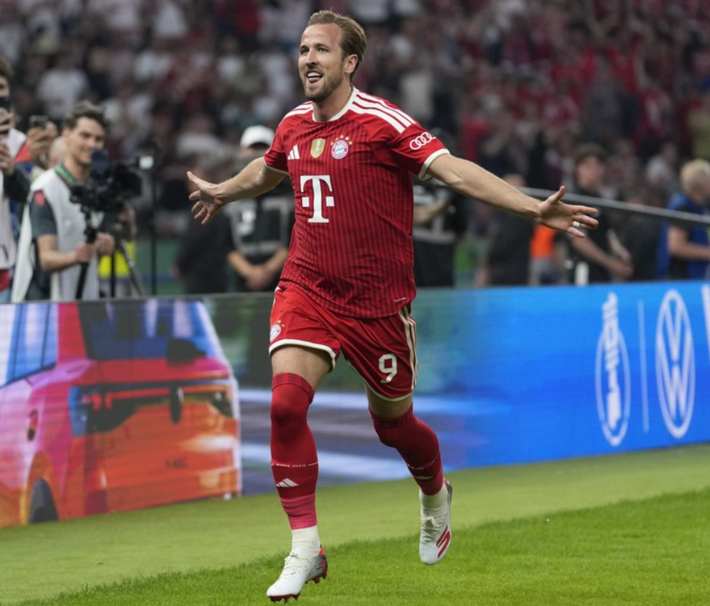 Harry Kane celebrates after scoring for Bayern Munich in Bundesliga match