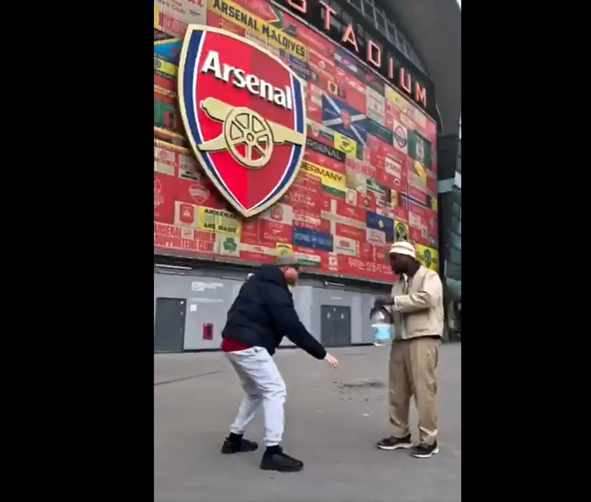 Tunde Perry sprays Zamzam water at Emirates Stadium in symbolic prayer for Arsenal Champions League success