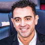 Xavi Hernandez poses after being unveiled as the new Netherlands national team coach